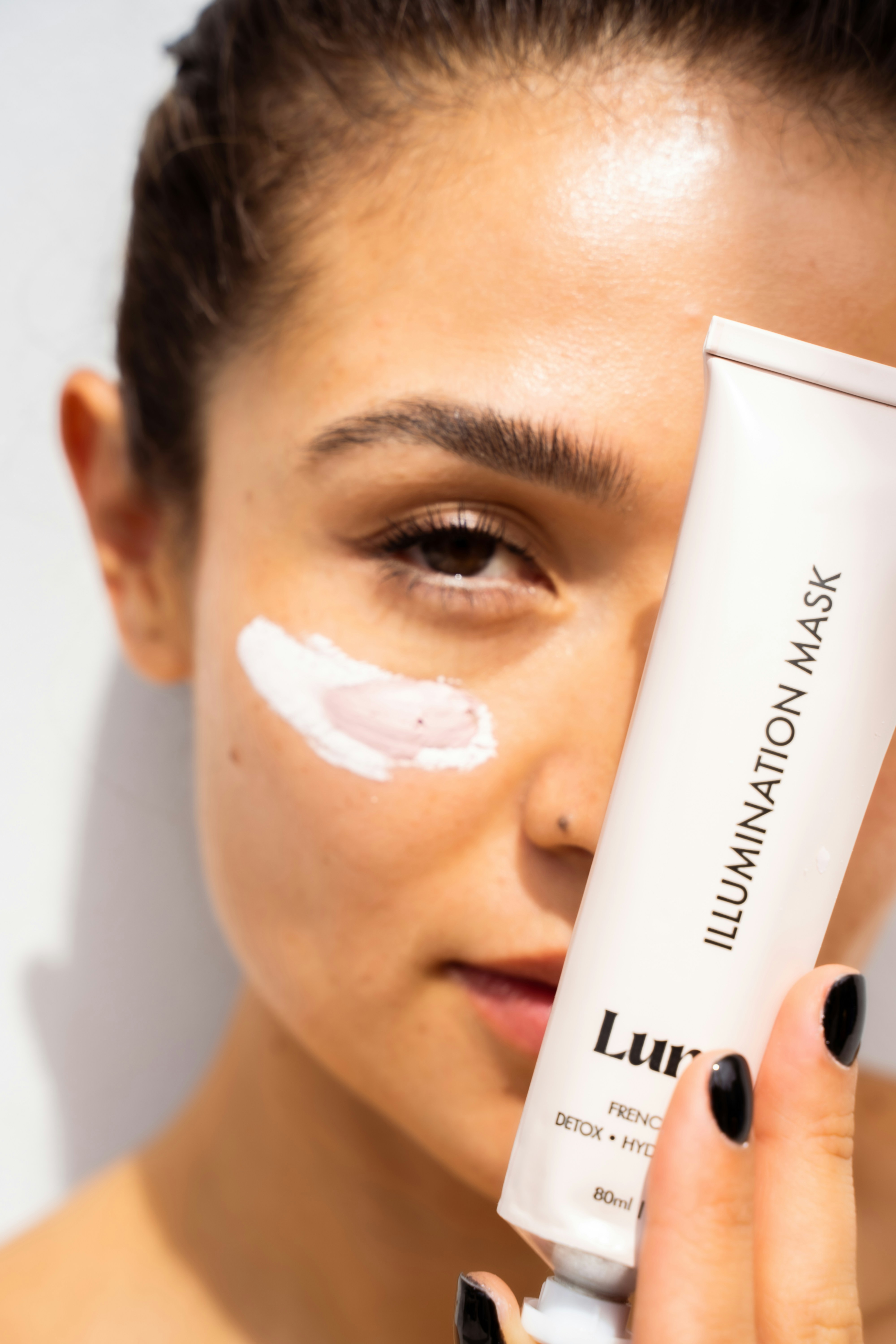 Skincare products on neutral background